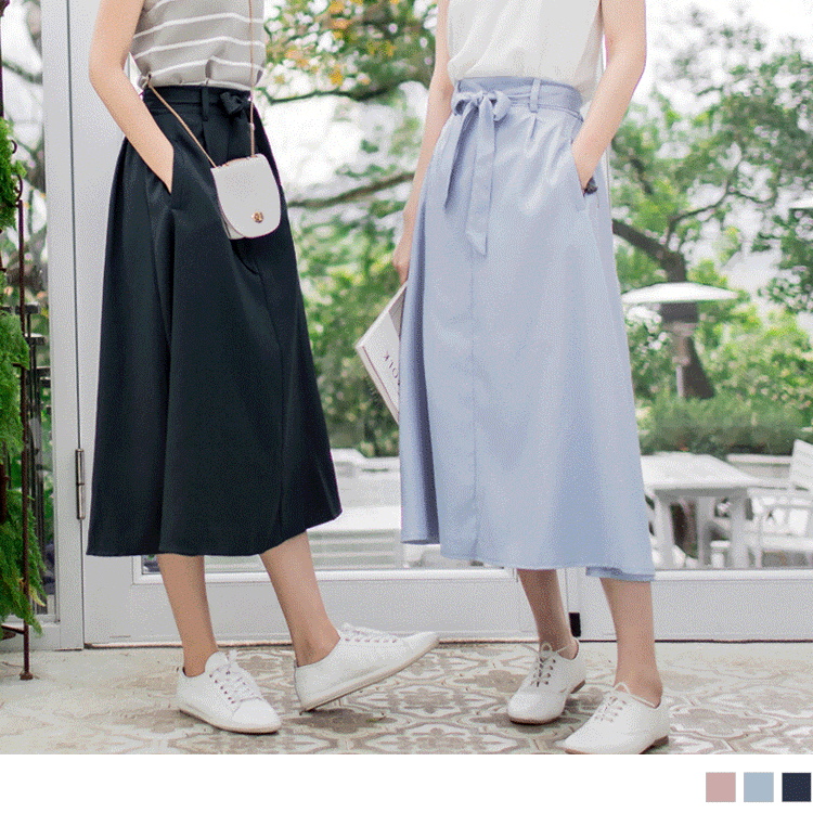 0512新品 素色綁帶雙口袋中線造型A字長裙．3色
