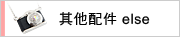 �~�M